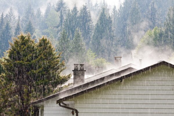 Heavy rain falling on a roof