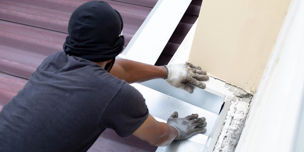 A man repairing a roof.